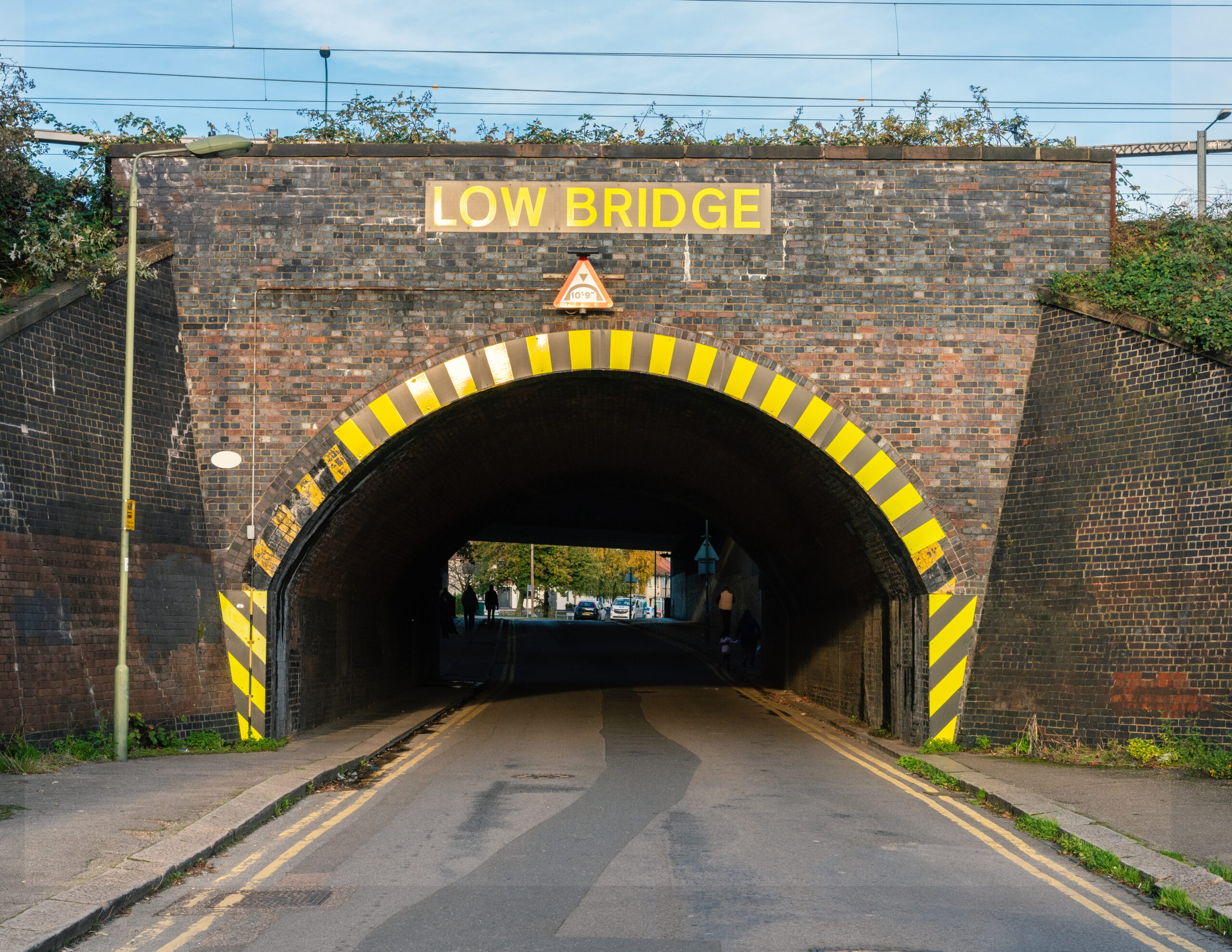 Low,Bridge,Warning,To,Drivers,About,The,Height,Restriction.